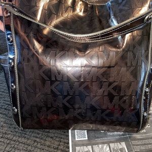 Authentic Michael Kors shoulder bag price is firm